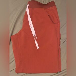 Figs burnt orange scrub joggers